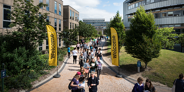 the university of York campus aerial shot with welcome banners